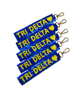 Load image into Gallery viewer, Delta Delta Delta Sequin Heart Wristlet
